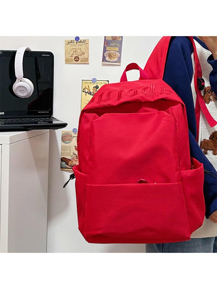Schoolbag simple solid color middle and high school student schoolbag female 1011 new male large capacity backpack short trip backpack