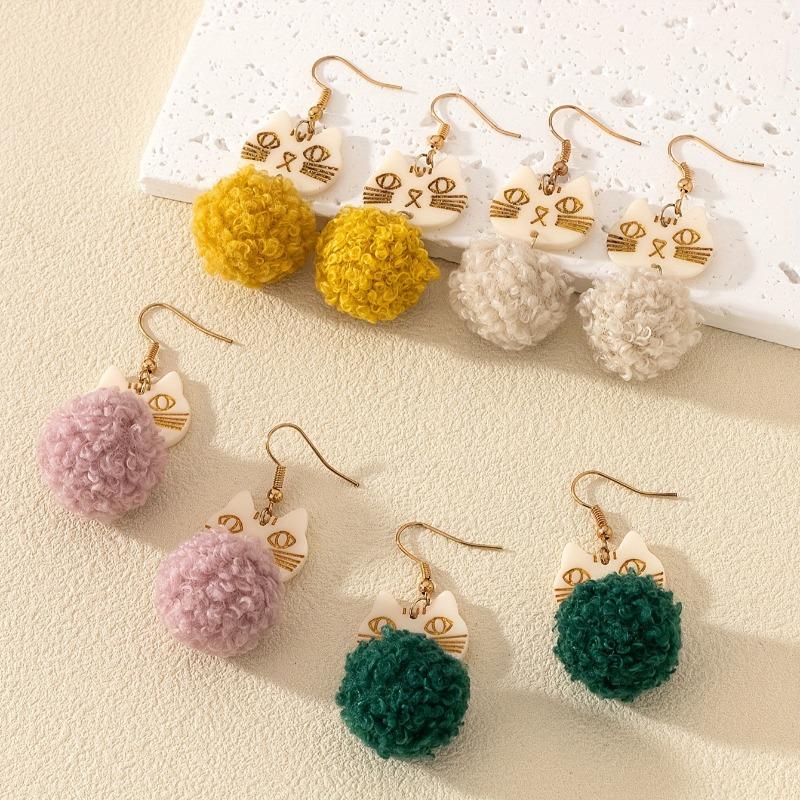 A set of four pairs of winter retro acrylic earrings, simple, fashionable and atmospheric hairball series earrings, earrings.