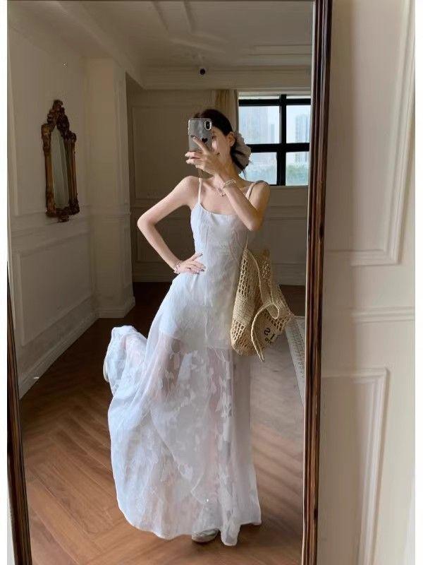 Seaside vacation wind green suspender dress women's summer temperament mesh stitching waist thin a-word skirt long dress