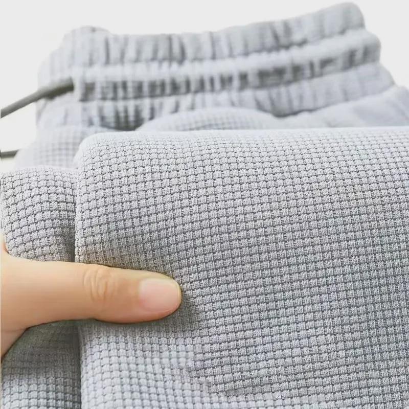 

2024 Мужские модные повседневные брюки со свободными манжетами - эластичные, весенние и осенние XL