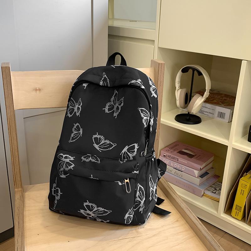 

New simple cartoon butterfly backpack, primary and secondary school student campus schoolbag, large capacity and lightweight travel backpack чорний