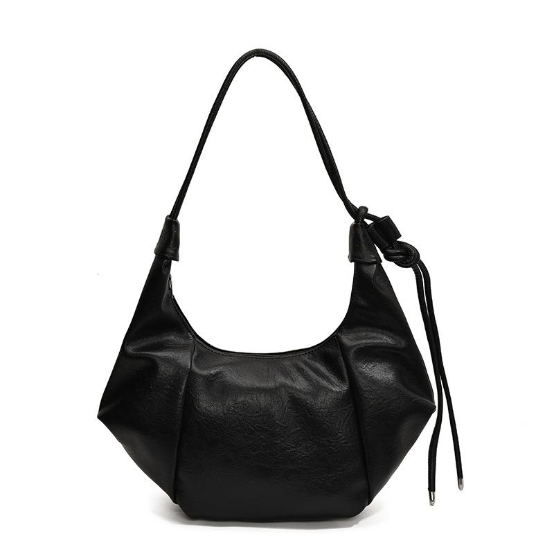 High-end bag women's large-capacity new trendy autumn and winter retro niche design messenger bag commuter dumpling bag