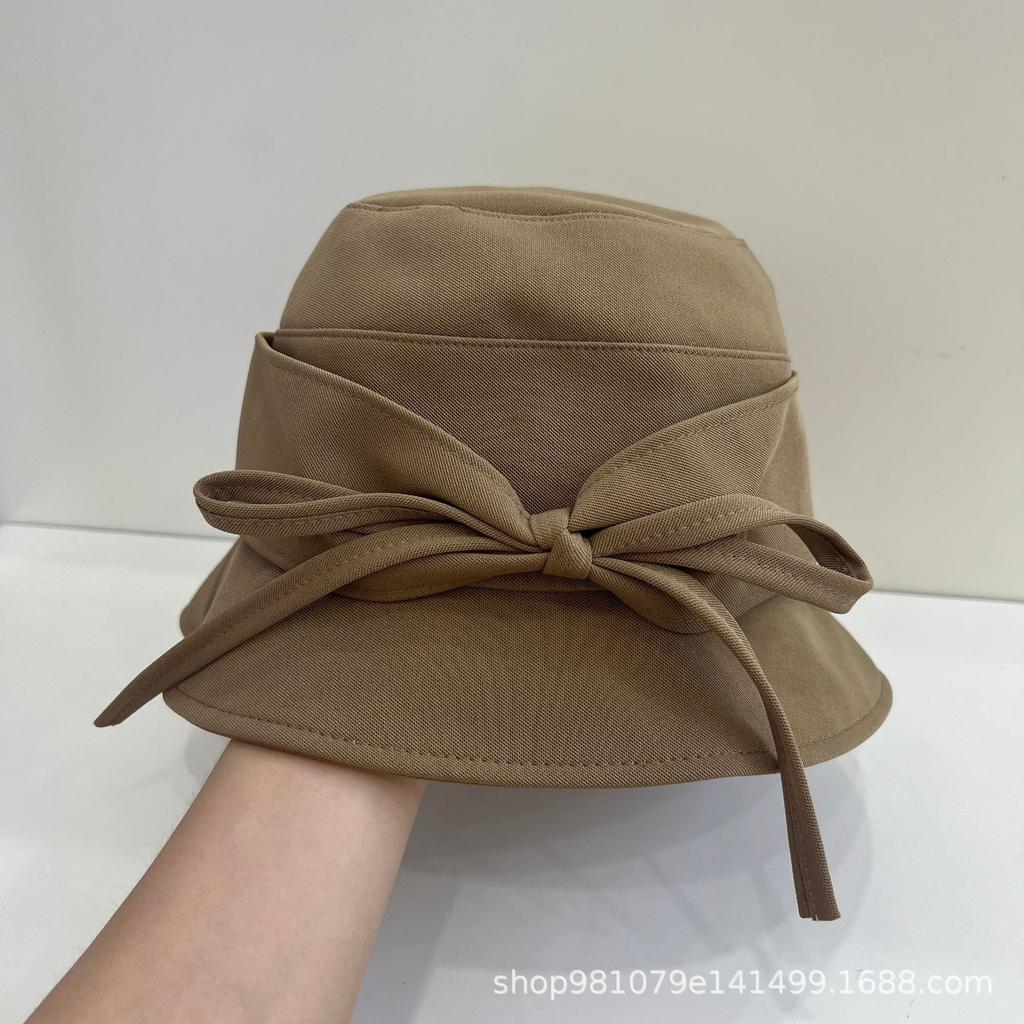 South Korea's New Adjustable Tether Bow Casual Cloth Hat Bucket Hat Women's Early Autumn Washbasin Hat Tide