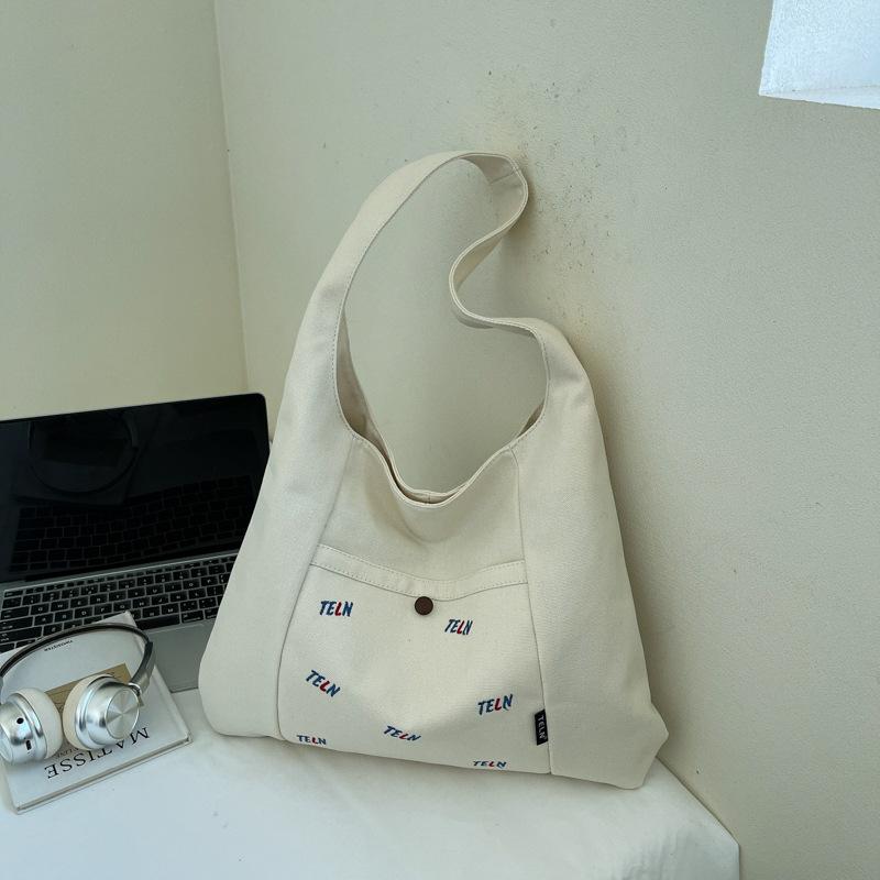 Canvas Bag Women's 2025 Autumn New Fashion Shoulder Bag Large Capacity Commuting Korean Niche Design Underarm Bag