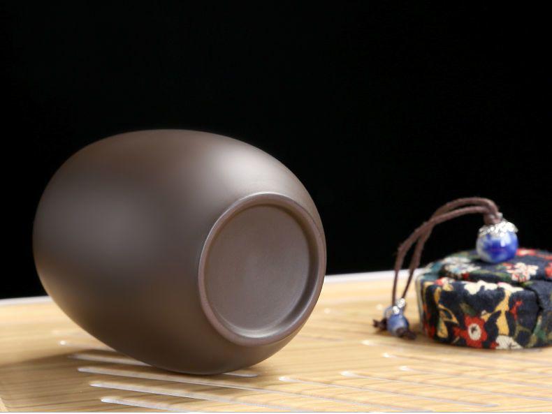 Zisha Travel Tea Set: Portable Xishi Pot with Quick-Brew Cup and Four Cups - Perfect for Outdoor or Home Tea Ceremonies.