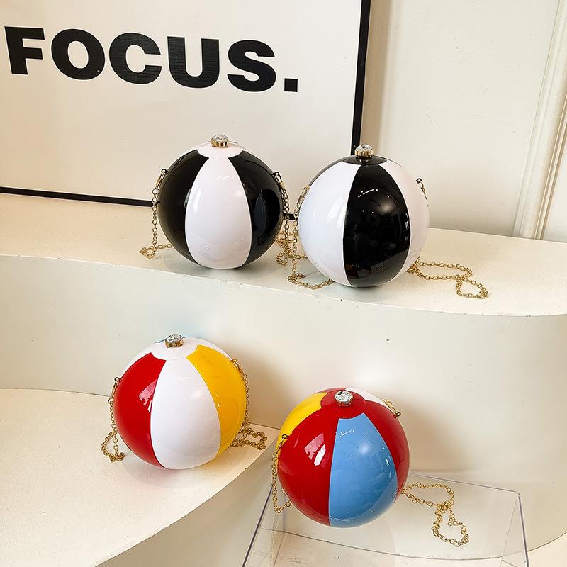 Personalized and creative football bag 2025 new European and American acrylic dinner bag women's contrasting color shoulder chain small round bag