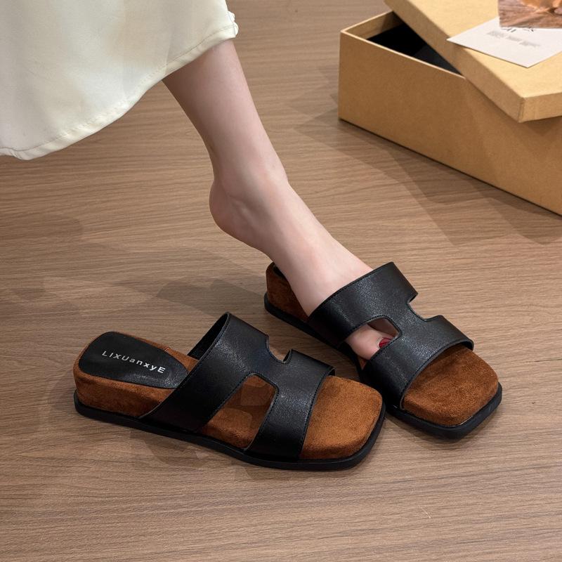 Retro versatile one-word slippers women's 2025 summer new outer wear retro flat bottom heightening sandals simple sandals tide