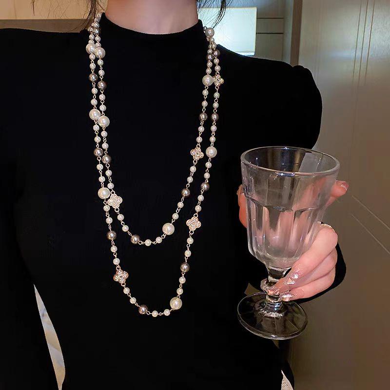 Elegant Pearl Four-Leaf Clover Women's Necklace - Versatile Layered Sweater Chain for Autumn/Winter