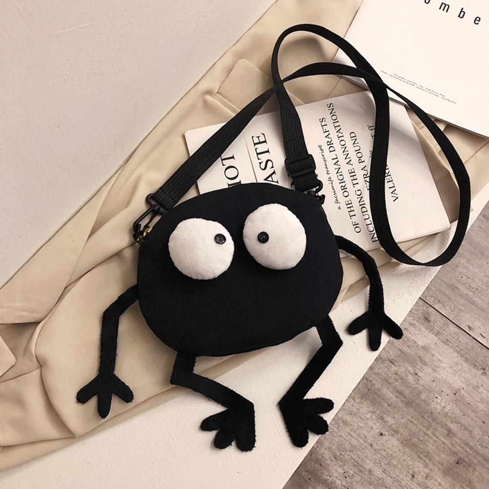 New Cartoon Big-eyed Monster Women's Bag Small Messenger Bag Unisex Black Canvas Shoulder Bag Telescopic shoulder strap Handbags