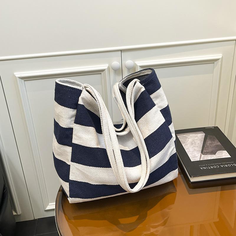 Travel bag canvas bag office worker commuter women large capacity Korean version striped fashion shoulder bag canvas bag shopping