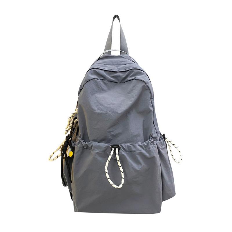 

Lightweight backpack large capacity nylon fashion backpack commuter college student backpack drawstring middle and high school book bag сірий колір