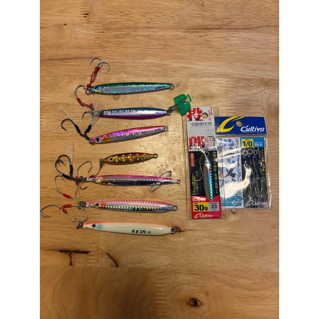 Used Set of 8 metal jigs, shooting jig with assist hook