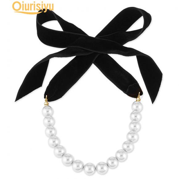 

Чокер из искусственного жемчуга с бантом чёрный