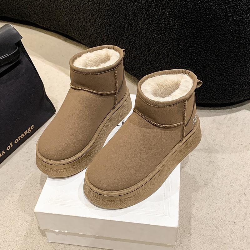 Autumn and winter snow boots women's 2025 new thick-soled thickened thermal cotton shoes with one foot pedal solid color short tube cold-proof boot