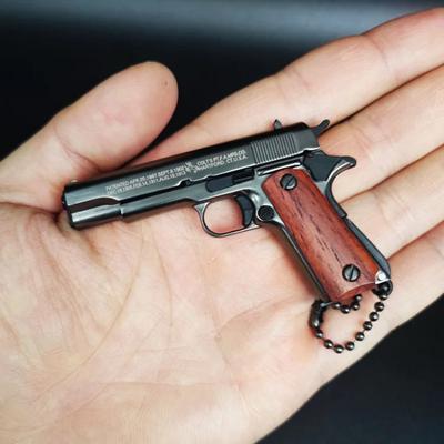 1:3 Maßstab Legierung Colt 1911 Pistole Mini Gun Metall Schlüsselanhänger Colt 1911 Pistole Schlüsselanhänger Zappeln Spielzeug PUBG Pistole Geschenk Pubg Dekoration Spielzeug