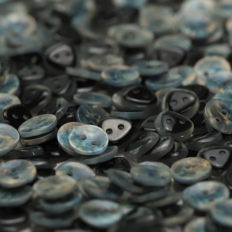 

MOSN Imitation Shell Resin Two-Hole Button for Shirts, Sweaters, Dresses, Knit Cardigans, Tops, Sleeves, and Collars.