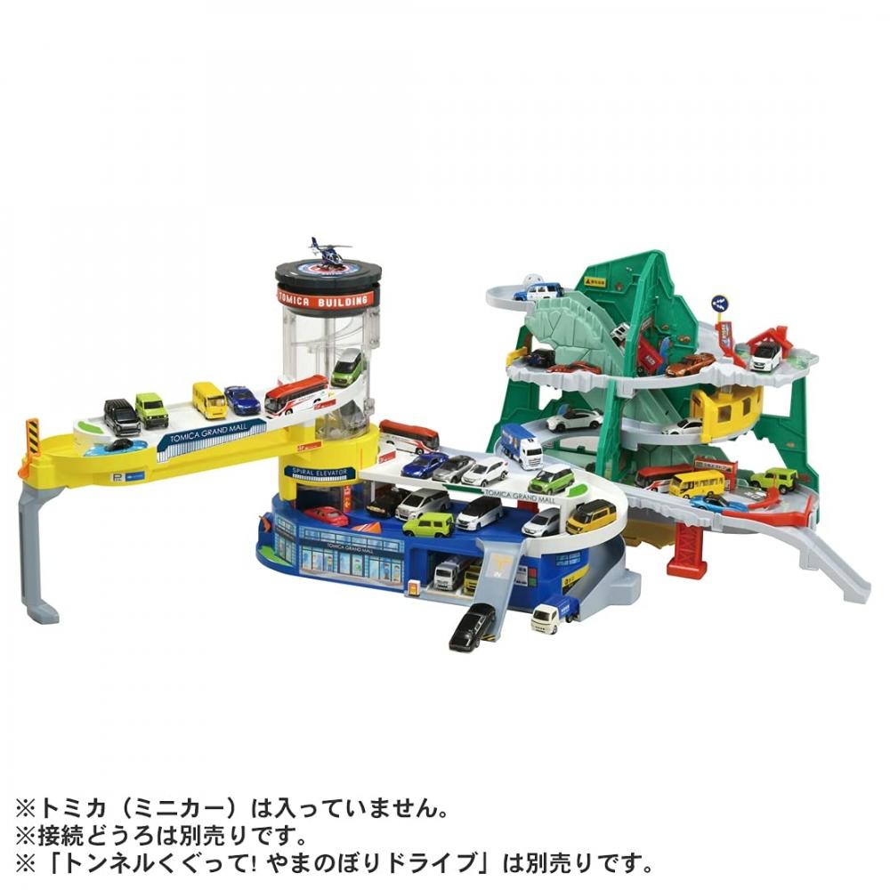 TAKARA TOMY Hračka do auta "Tomica Double Action Tomica Building" Mini autíčko pro chlapce od 3 let splňuje bezpečnostní normy pro hračky Certifikace ST Mark TOMICA
