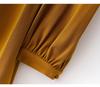 Waist cinching temperament long sleeved mid length skirt