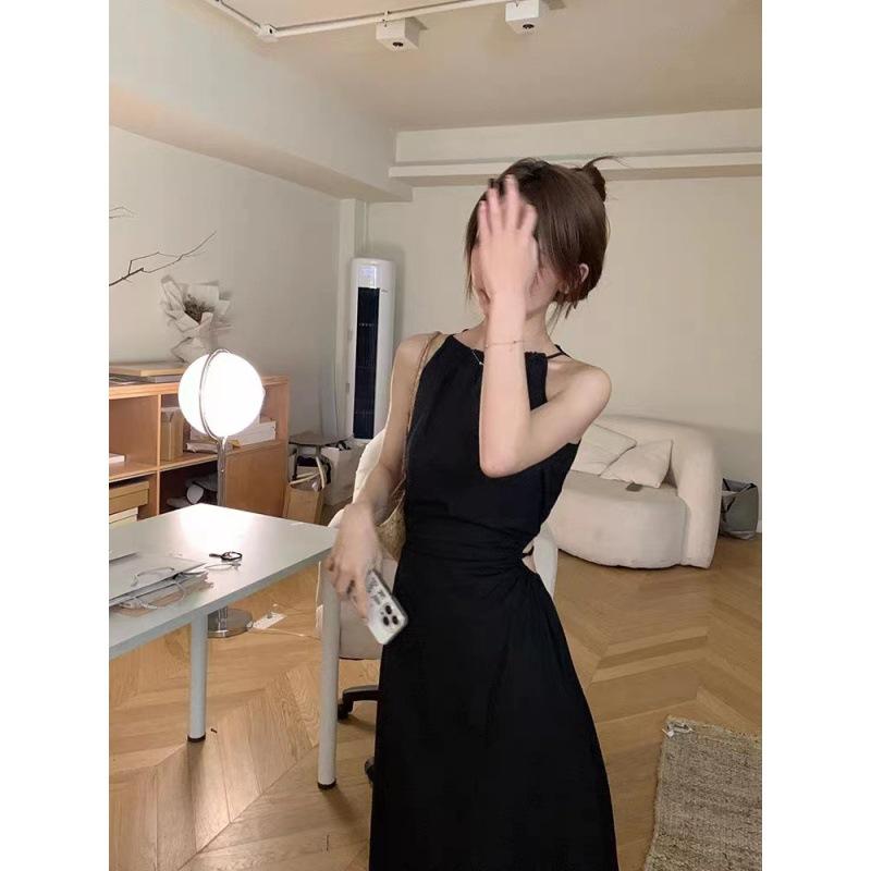 Design sense hollow waist hanging neck suspender dress women's summer lace-up waist thin holiday merry Suzhong long dress