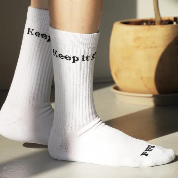 White lettering sports socks keep it simple.