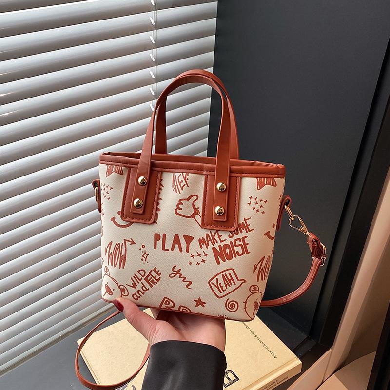 Fashionable and Trendy Printed Shoulder Bag for Women's New Simple Hand To Wear Tote Bag for College Students' Commuting Class Bag