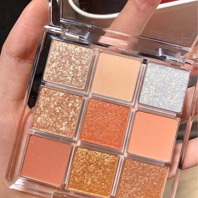 DIKALU 9-Color Earth Tone Eyeshadow Palette - Shimmer & Matte, Transparent Douyin Style.