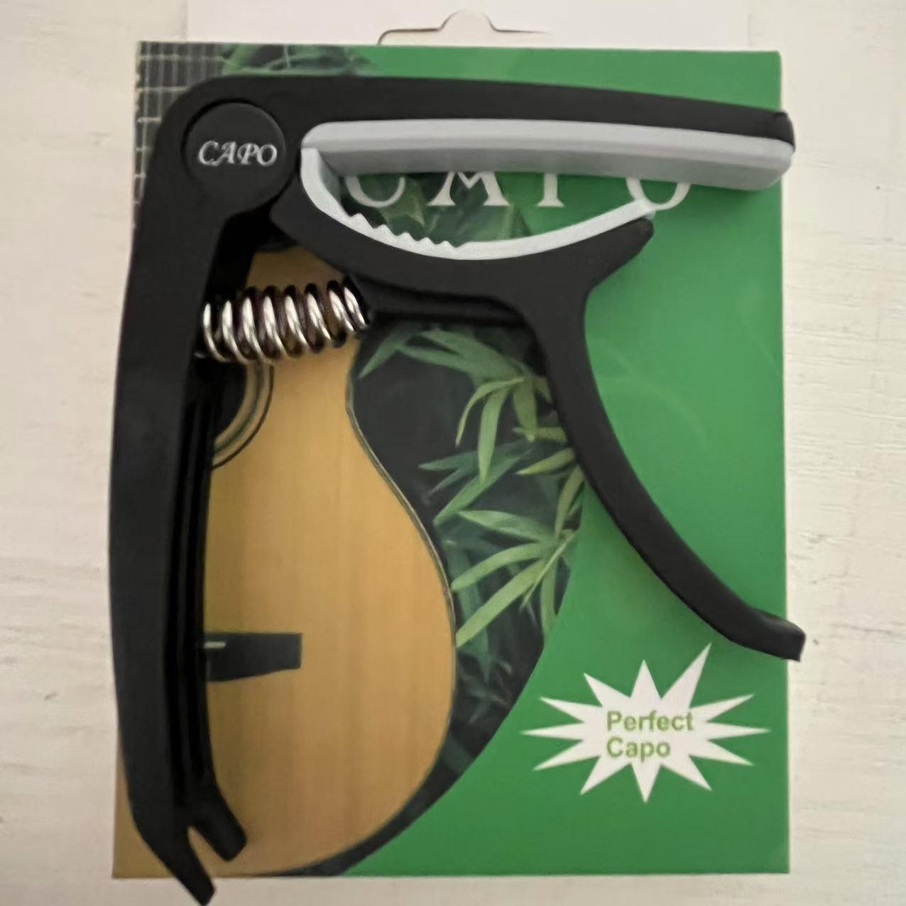 Universal Guitar & Ukulele Capo - Plastic & Steel