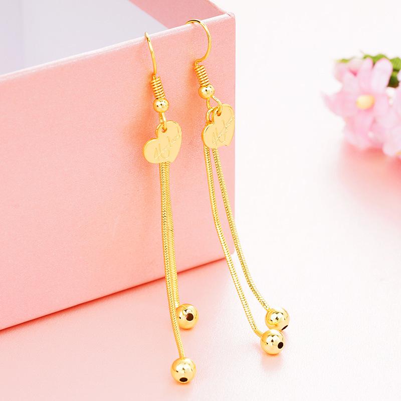 Elegant Gold Star Tassel Earrings: Vietnamese Simplicity Meets Korean Style
