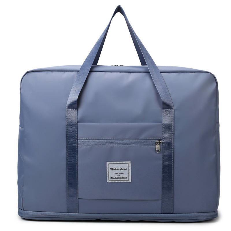 Luggage bags, new large-capacity expansion short-distance travel bags, portable maternity and maternity storage bags.