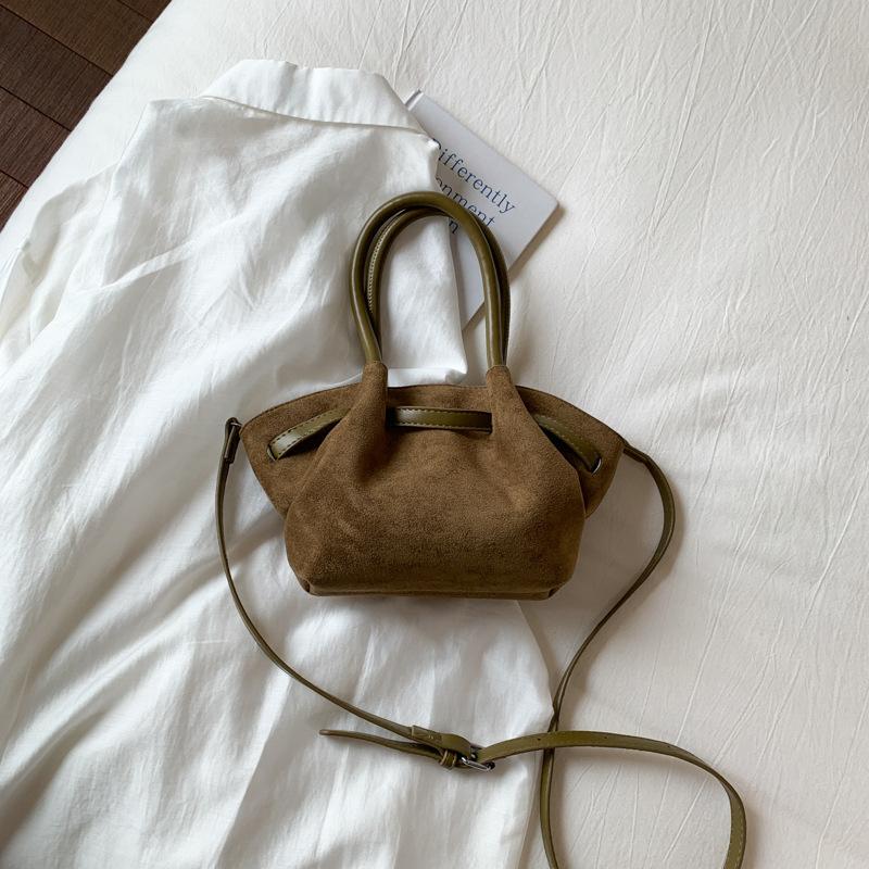 Frosted retro portable small bag women's 2025 new fashion bucket bag niche design messenger bag wing bag tide