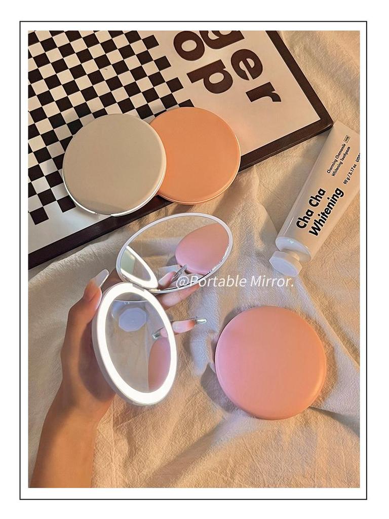 Portable LED Light Makeup Mirror - Compact, Handheld, Foldable, Round Mirror with Touch Light for Carry.