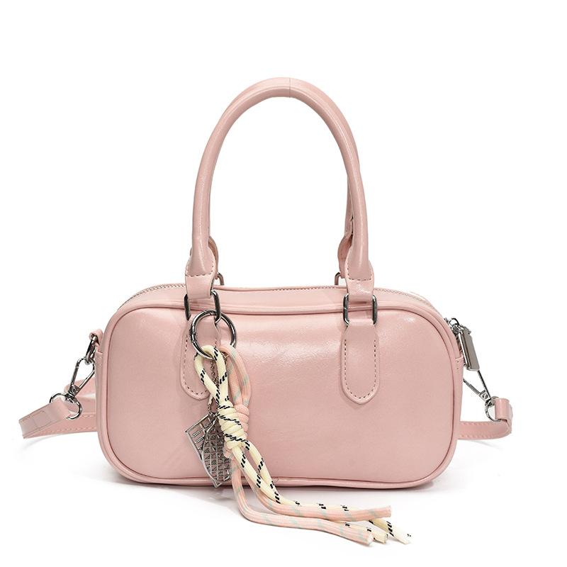 Retro commuting simple Korean version casual solid color portable bowling bag fashion high sense versatile commuting messenger bag