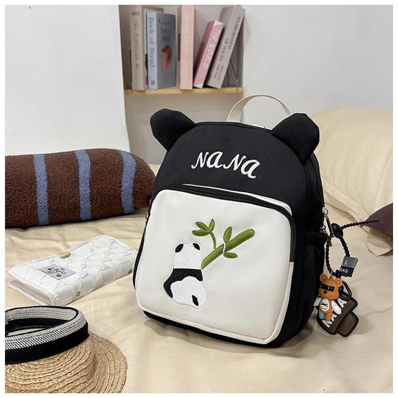 The new schoolbag is high-value, fresh, sweet and cute, red panda backpack, kindergarten level 1-3 large-capacity backpack.