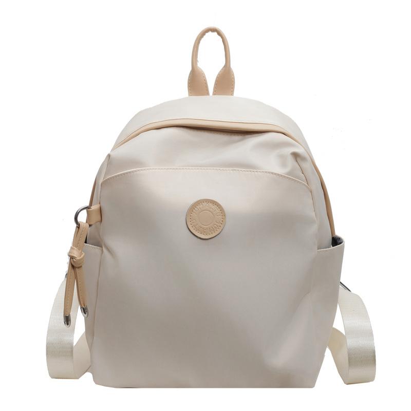 New commuter women s small schoolbag, light and fashionable women s travel backpack travel and leisure backpack bag 26*16*31