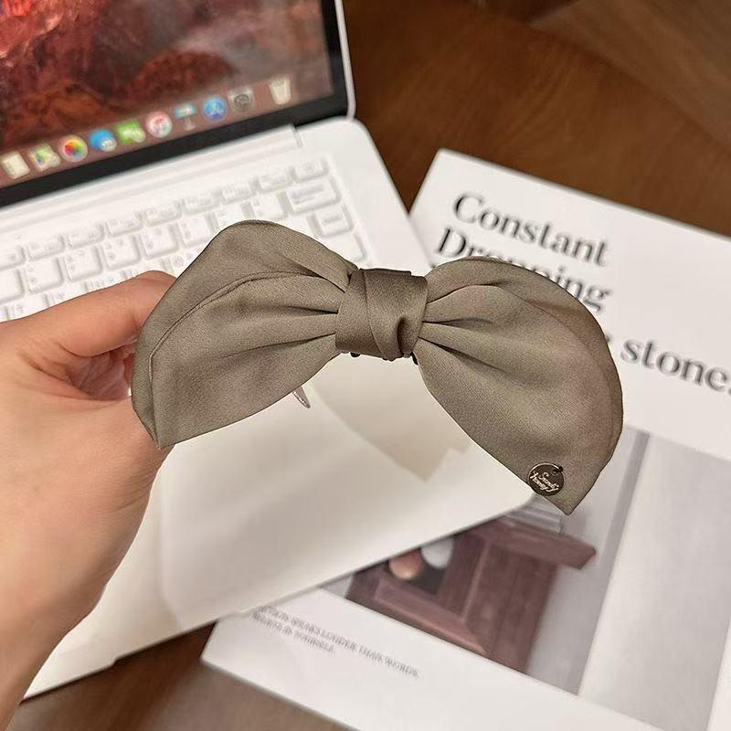 

High-Volume Satin Bow Banana Clip for Women: Vertical Ponytail & Updo Headwear
