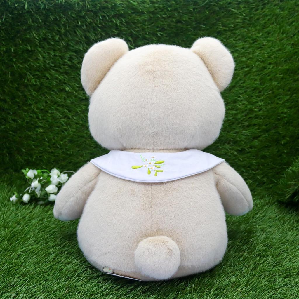 Take Off Bear Cub a retro bear with a cute floral embroidery on the beige plush toy with music Drop, pastel-colored collar. Large, box.