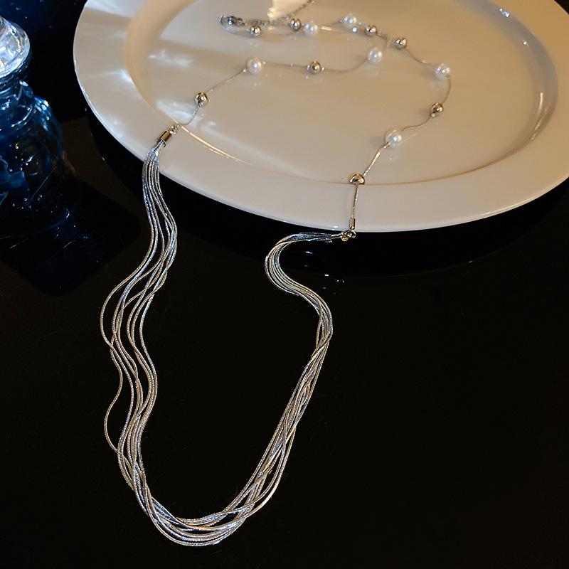 (Различные способы носить) Цепочка на свитер Длинная легкая роскошь высококачественное жемчужное ожерелье Женская 2025 новый популярный цепочка на ключицу