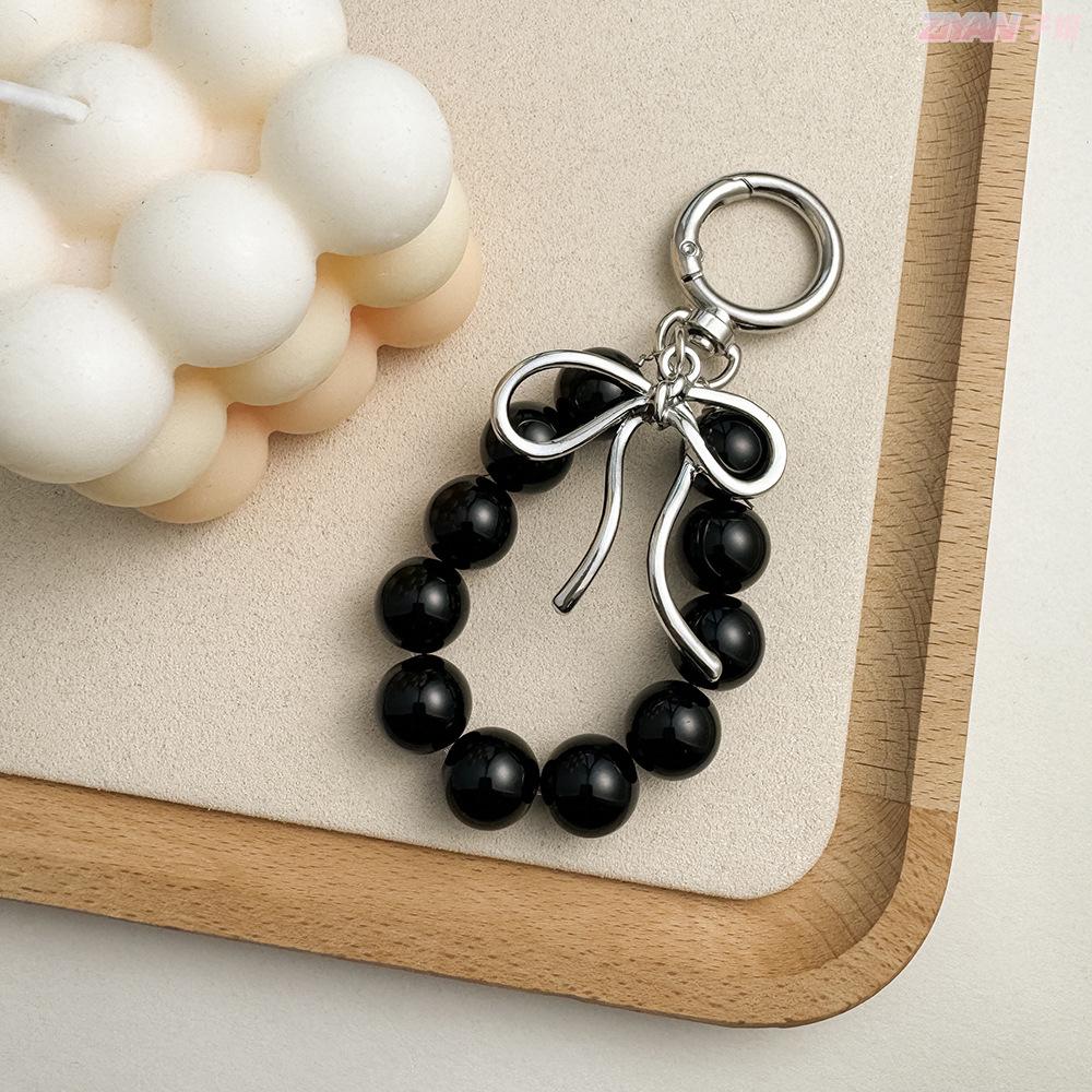 Korean Style Keychain Pendant: Metal Irregular Bow with Pearl Beads for Phone or Bag Accessories