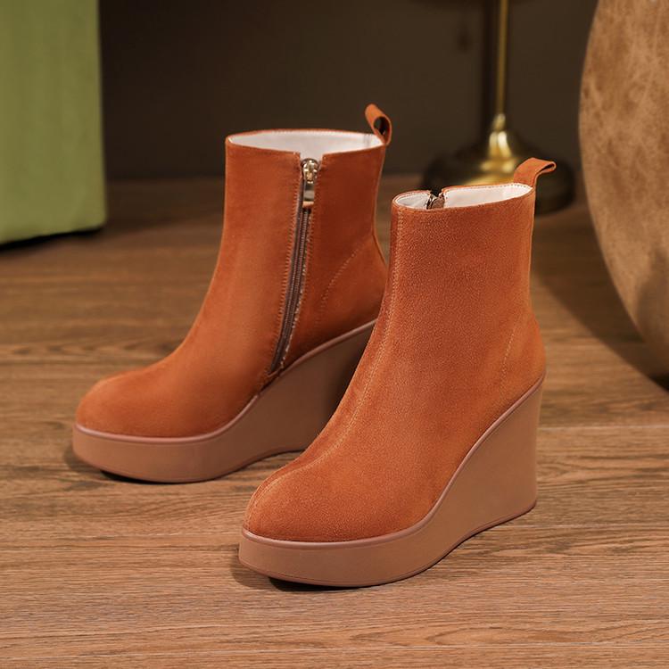 10Cm leather wedge heel short boots 2025 autumn and winter new small thick bottom side zipper super high heel pointed thin boots