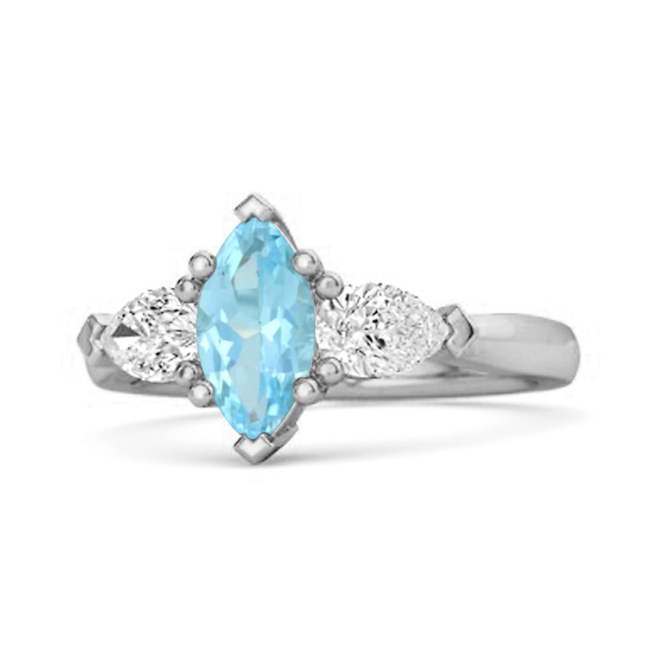 

Blue Topaz Trio Stone Tapered Ring - Sterling Silver 6 біле золото кольору