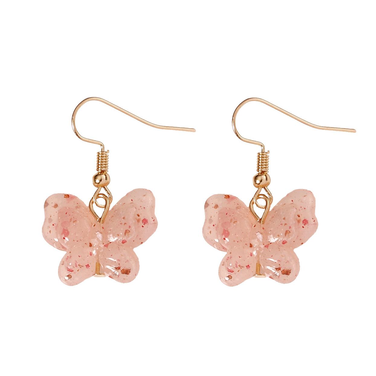 

The simple and elegant pink transparent butterfly-shaped earrings made by hand from Japan and South Korea are sweet and cute