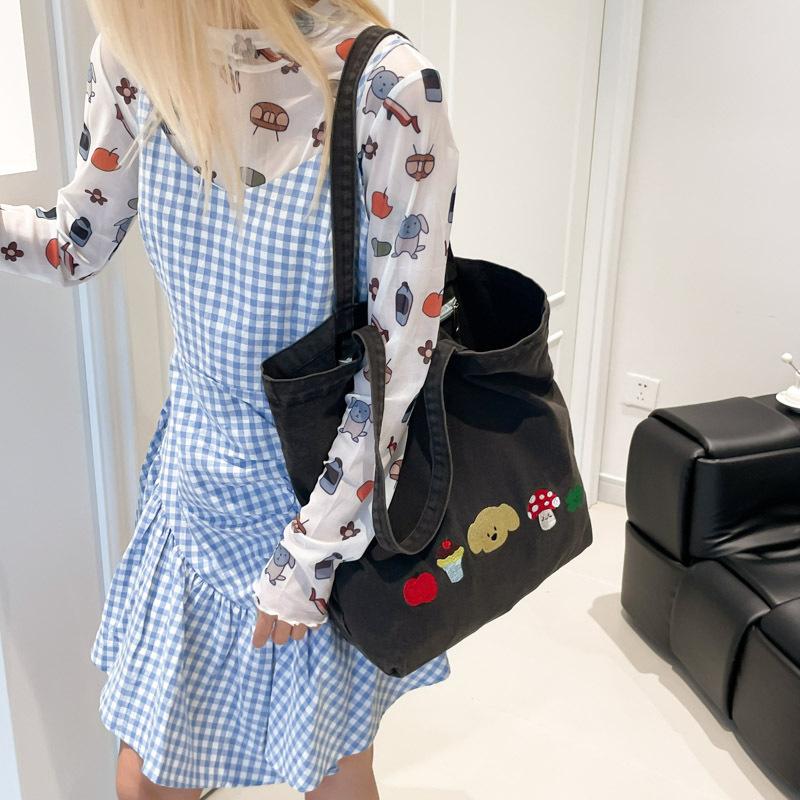 Casual canvas bag design sense niche women's bag 2025 new cartoon printed tote bag large capacity shoulder bag