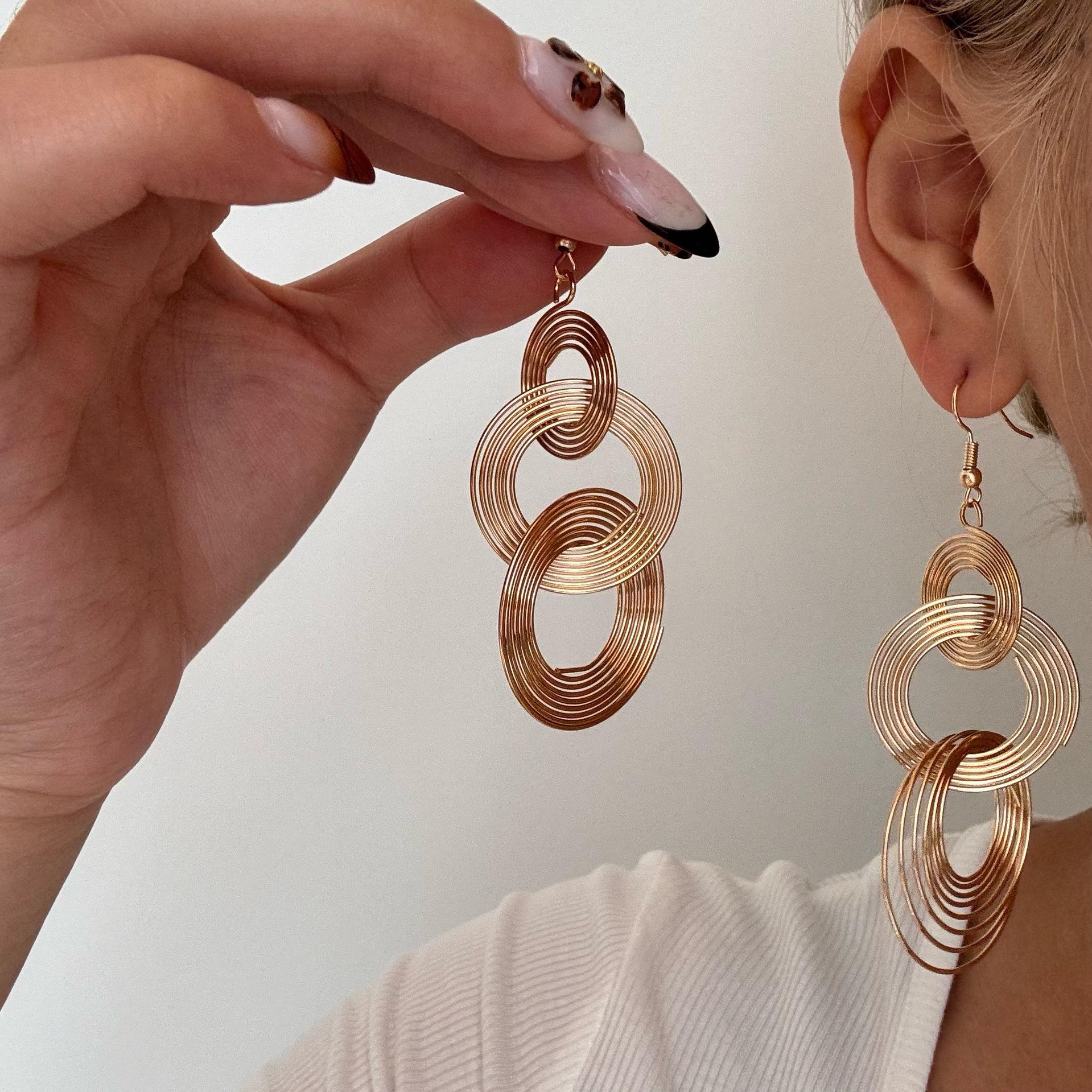 

European & American Geometric Circle Metal Long Pendant Earrings - Bold, Simple, Stylish Studs for Women