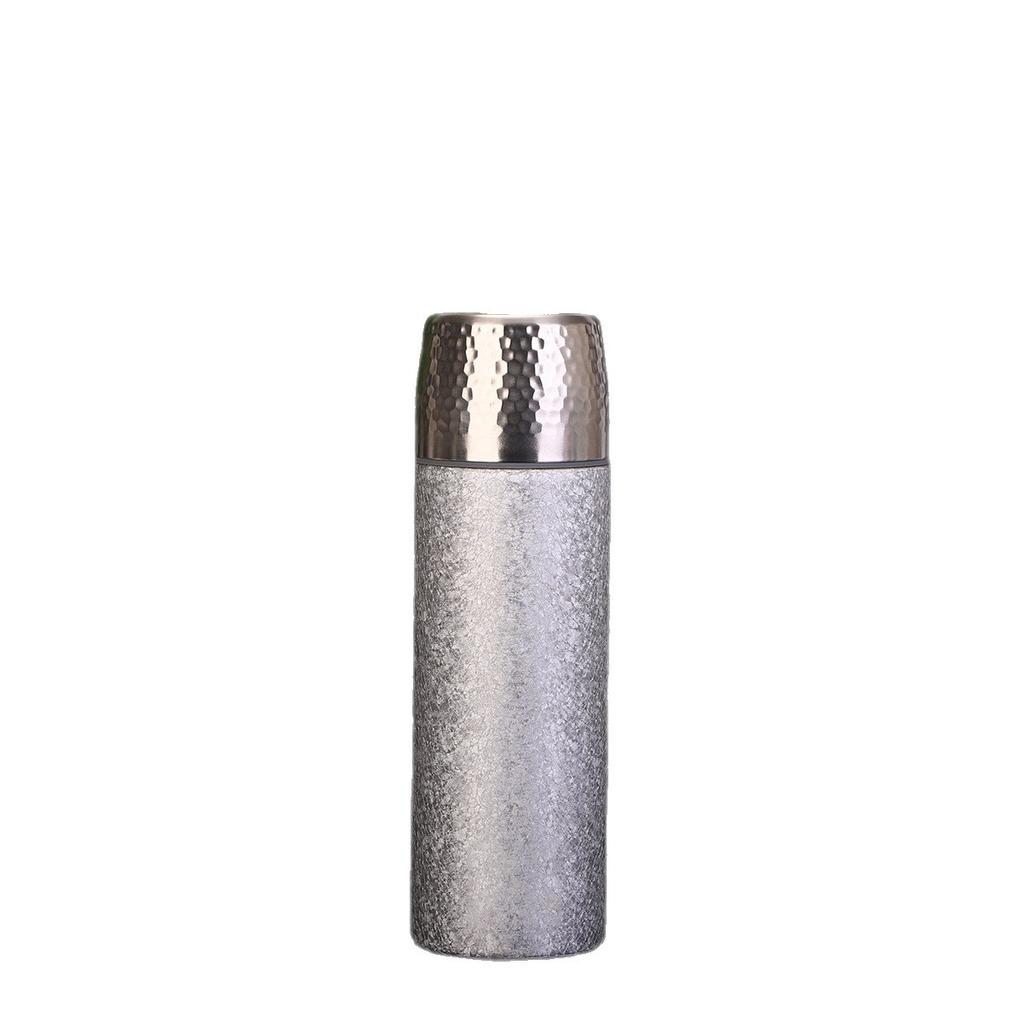 Light luxury hammer pattern titanium covered thermos cup fashionable tea separation ice crystal health tea cup high-end business gift titanium cup