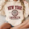 Women's autumn and winter warm and loose casual Paris pattern printed suede long sleeved hooded sweatshirt