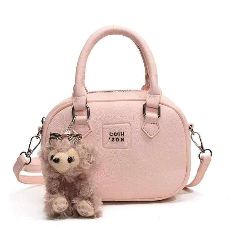 Early Spring Hot Sale French Niche Fashionable Portable Bowling Bag Solid Color Versatile Temperament Advanced Sense Messenger Women's Bag
