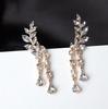 Korean version of the new sweet flash diamond pop leaf leaf tassel crystal water drop stud earrings B1