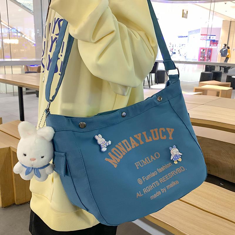 

Canvas Bag Ins Style Niche Women s Large Capacity Literary Letters Student Hand Held One Shoulder Crossbody Bag