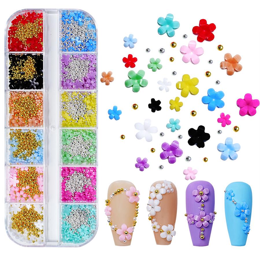 

Набор для нейл-арта «Пятилепестковый цветок»: 12 ячеек со смешанными цветами из смолы и золотыми/серебряными бисеринками.