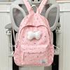 Polka Dot Bow Backpack for Teen Girls: Stylish and Versatile Schoolbag for Middle and High School Students.